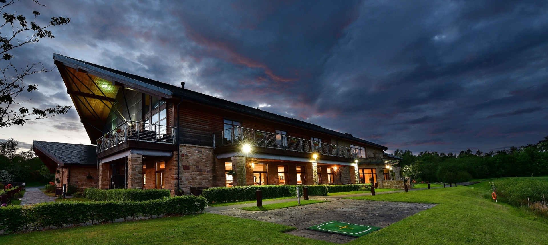 Exterior of the Cameron House Clubhouse at night time