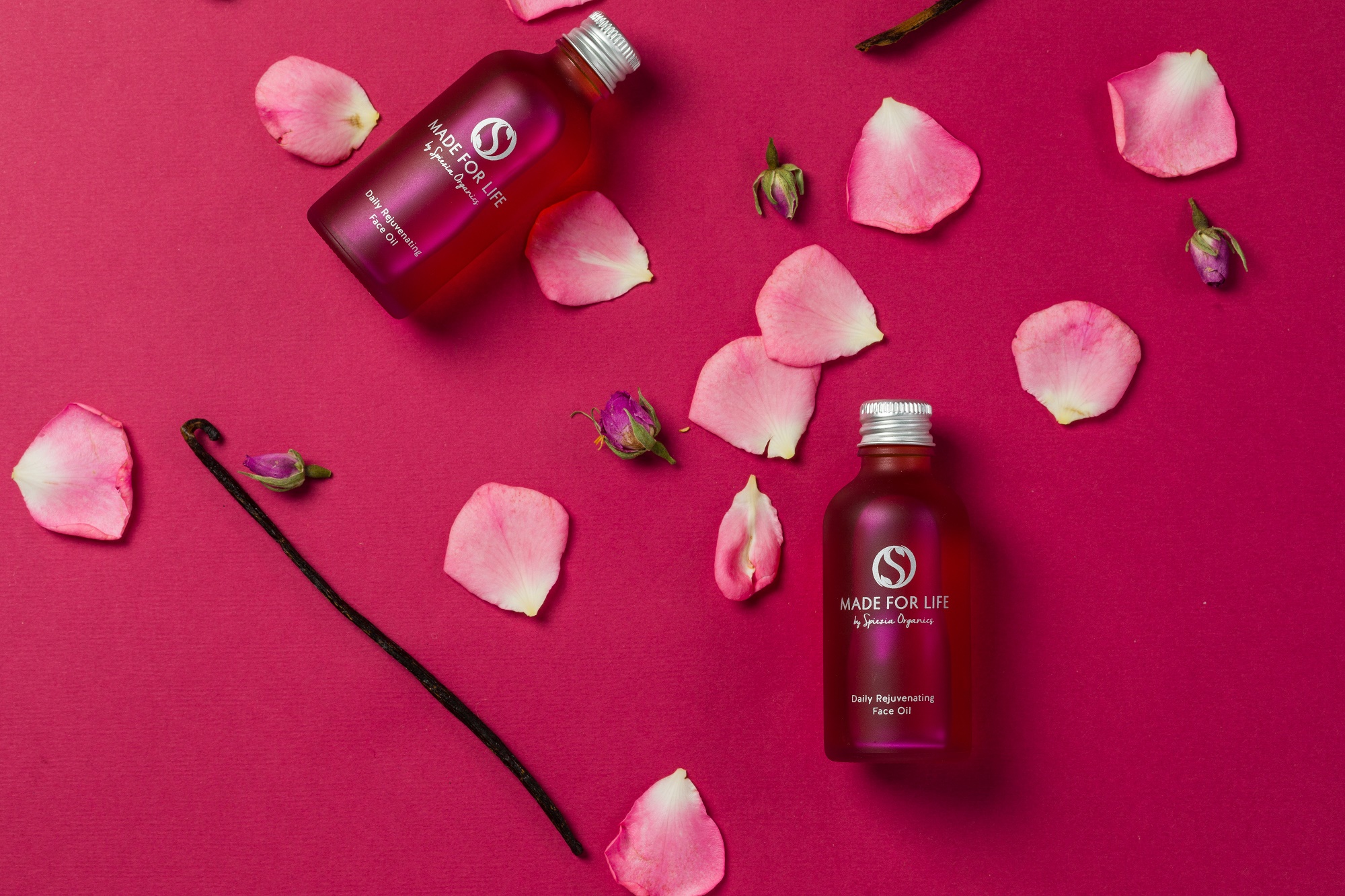 Made for Life products laying on a pink background surrounded by pink rose petals