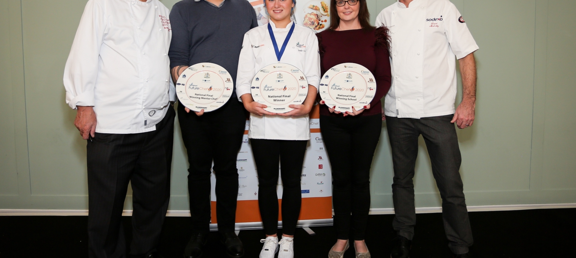 Cameron House apprentice, Jodie Cochrane, poses with staff members from the hotel