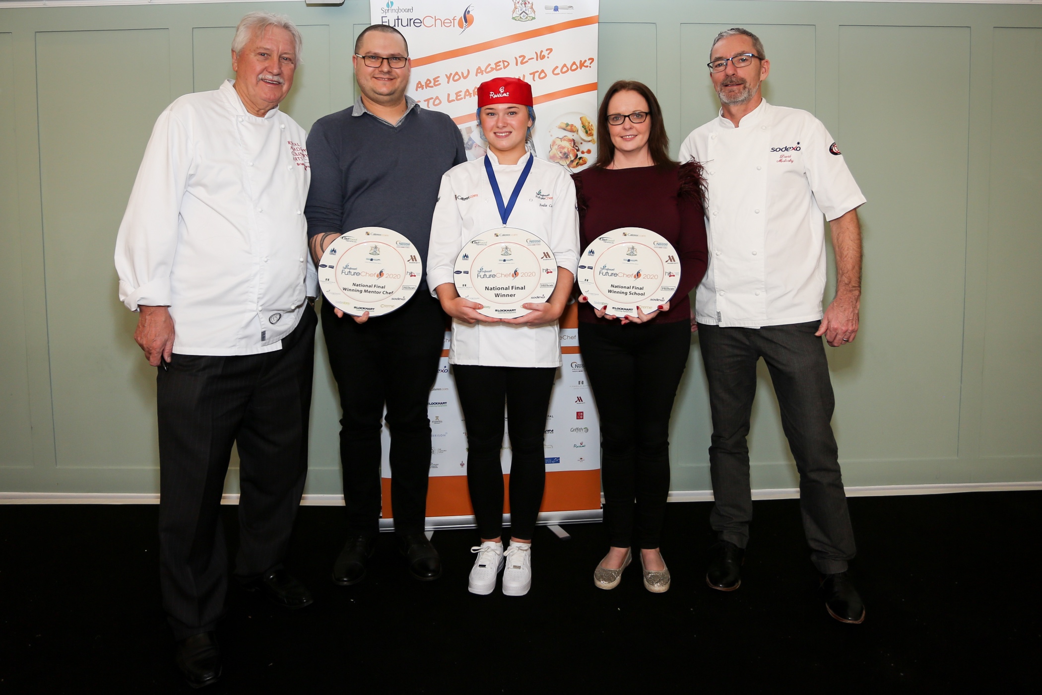 Cameron House apprentice, Jodie Cochrane, poses with staff members from the hotel