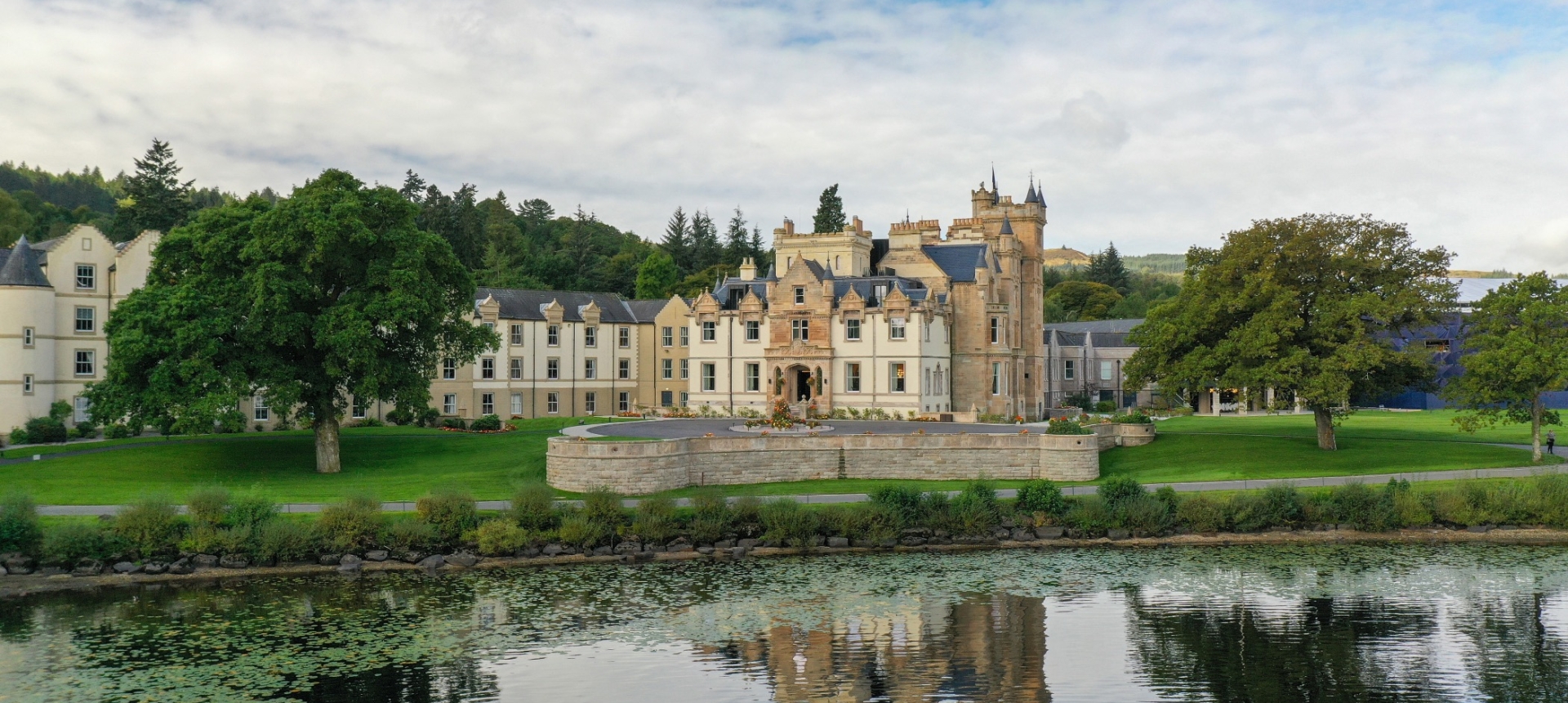 Exterior of the beautiful Camron House with a pond in the foreground