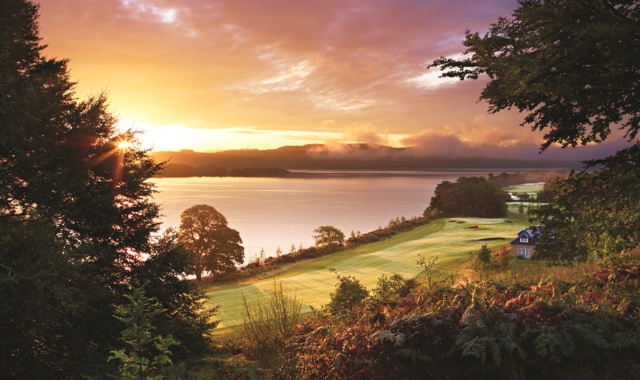 a view of the sunset and lake