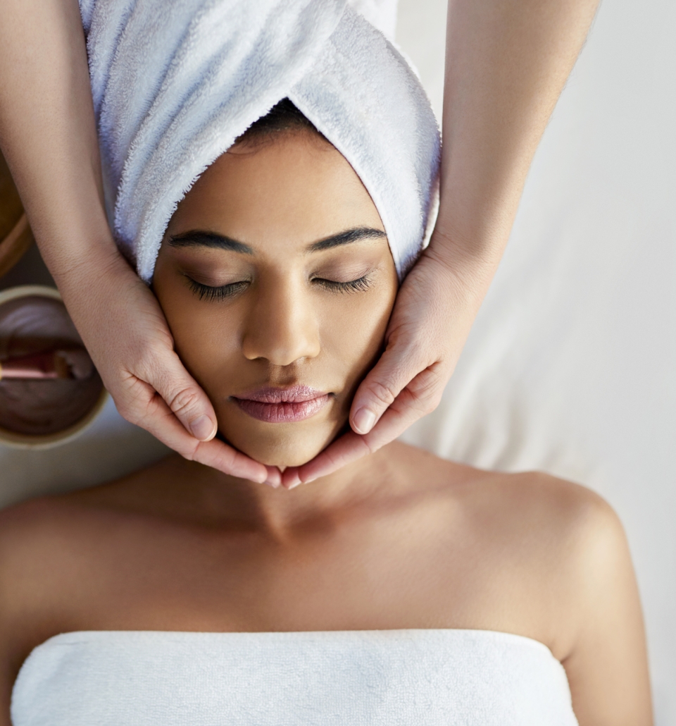 a person getting a face massage
