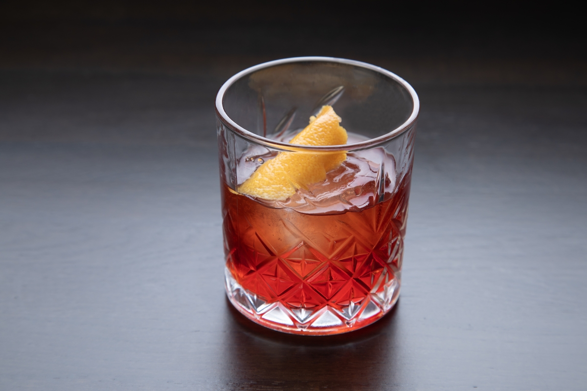 A Negroni cocktail with an orange slice garnish, served at La Vista restaurant.