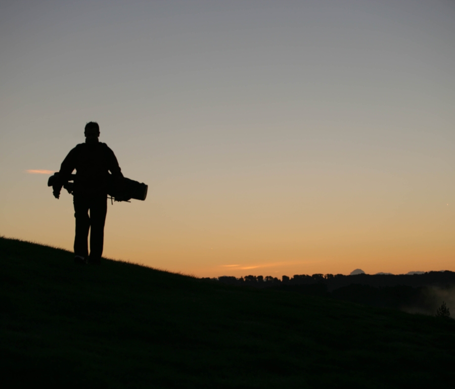 a person with a golfing bag