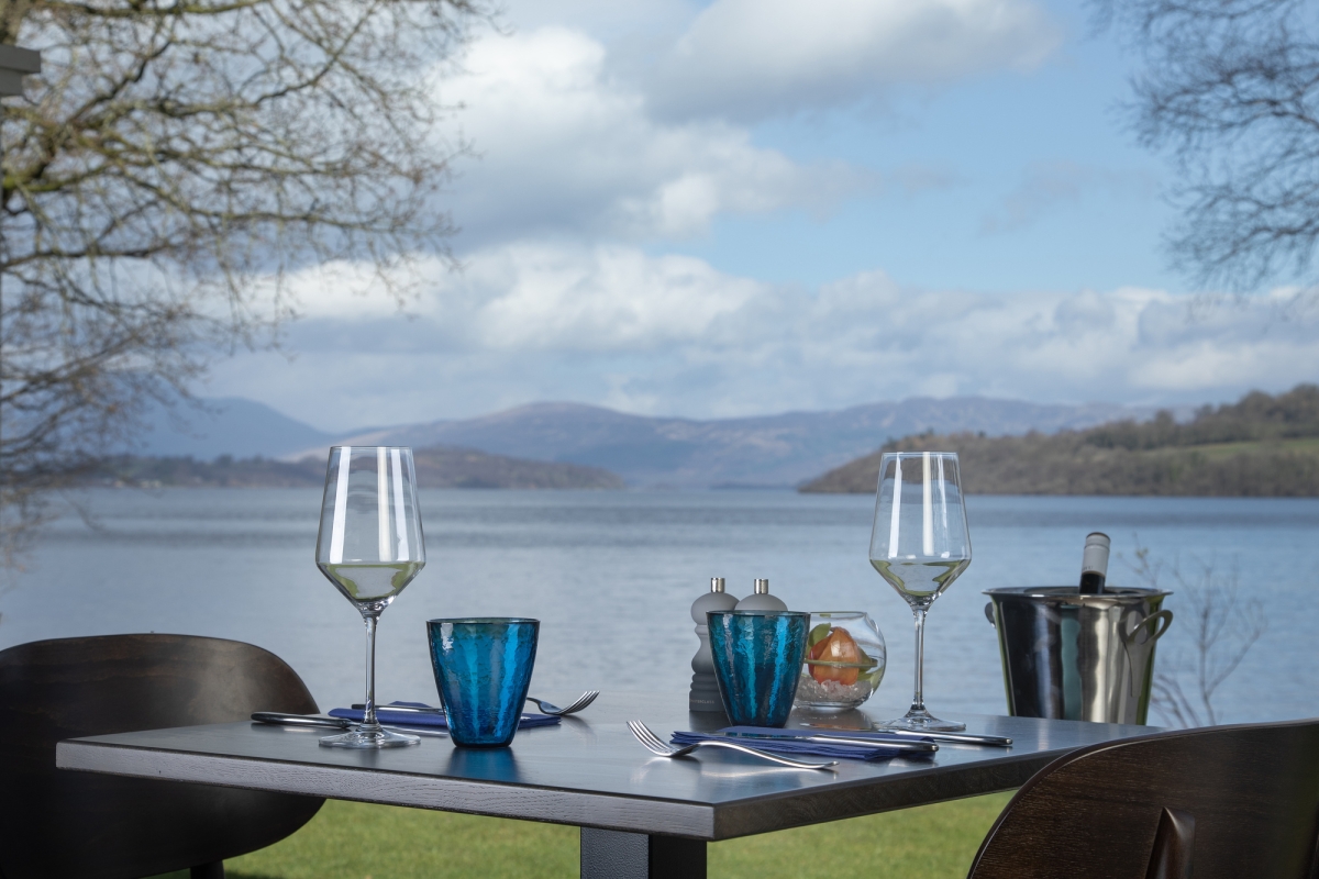 A table with two glasses at La Vista restaurant, overlooking Loch Lomond
