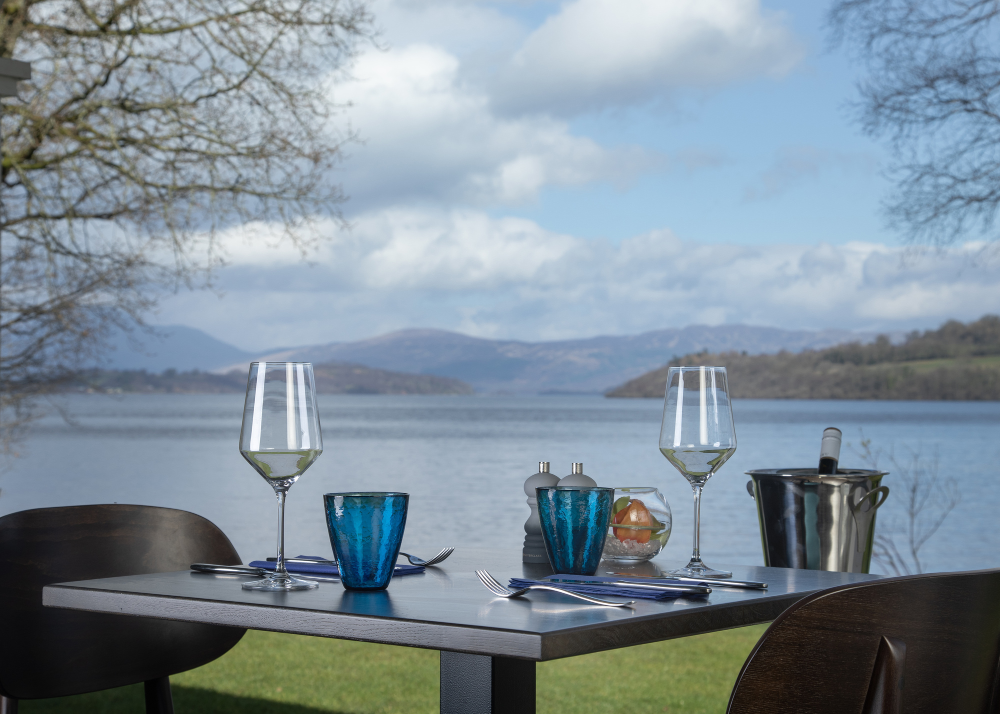 A table with two glasses at La Vista restaurant, overlooking Loch Lomond