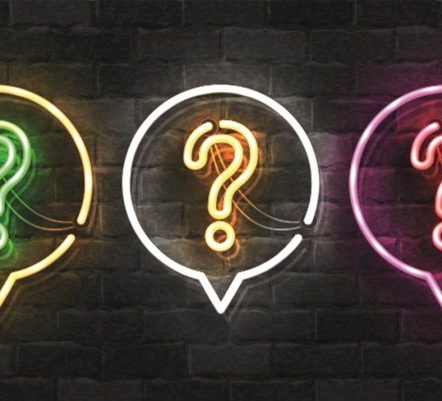 neon signs of a question mark