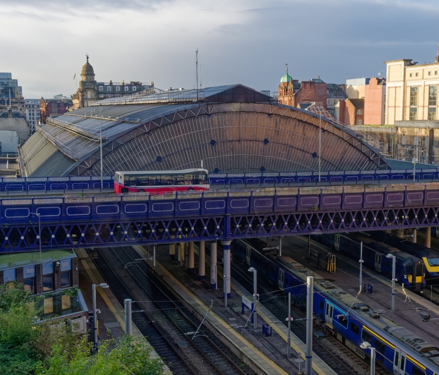 A train on a track outside the Queen Street Station.