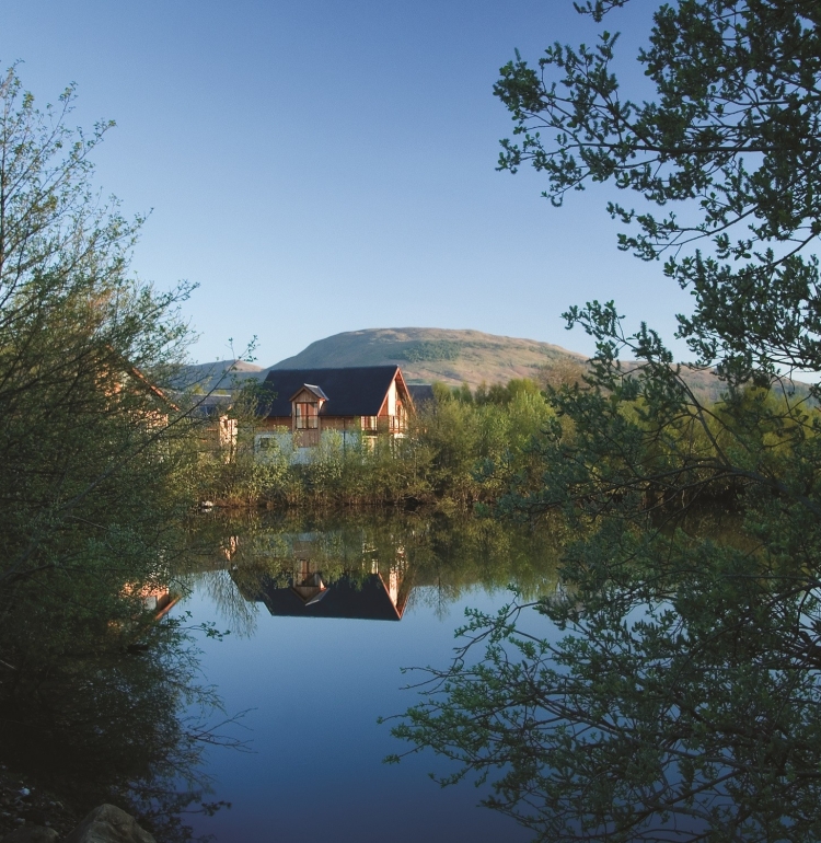 The Carrick Lodges as seen from across the water