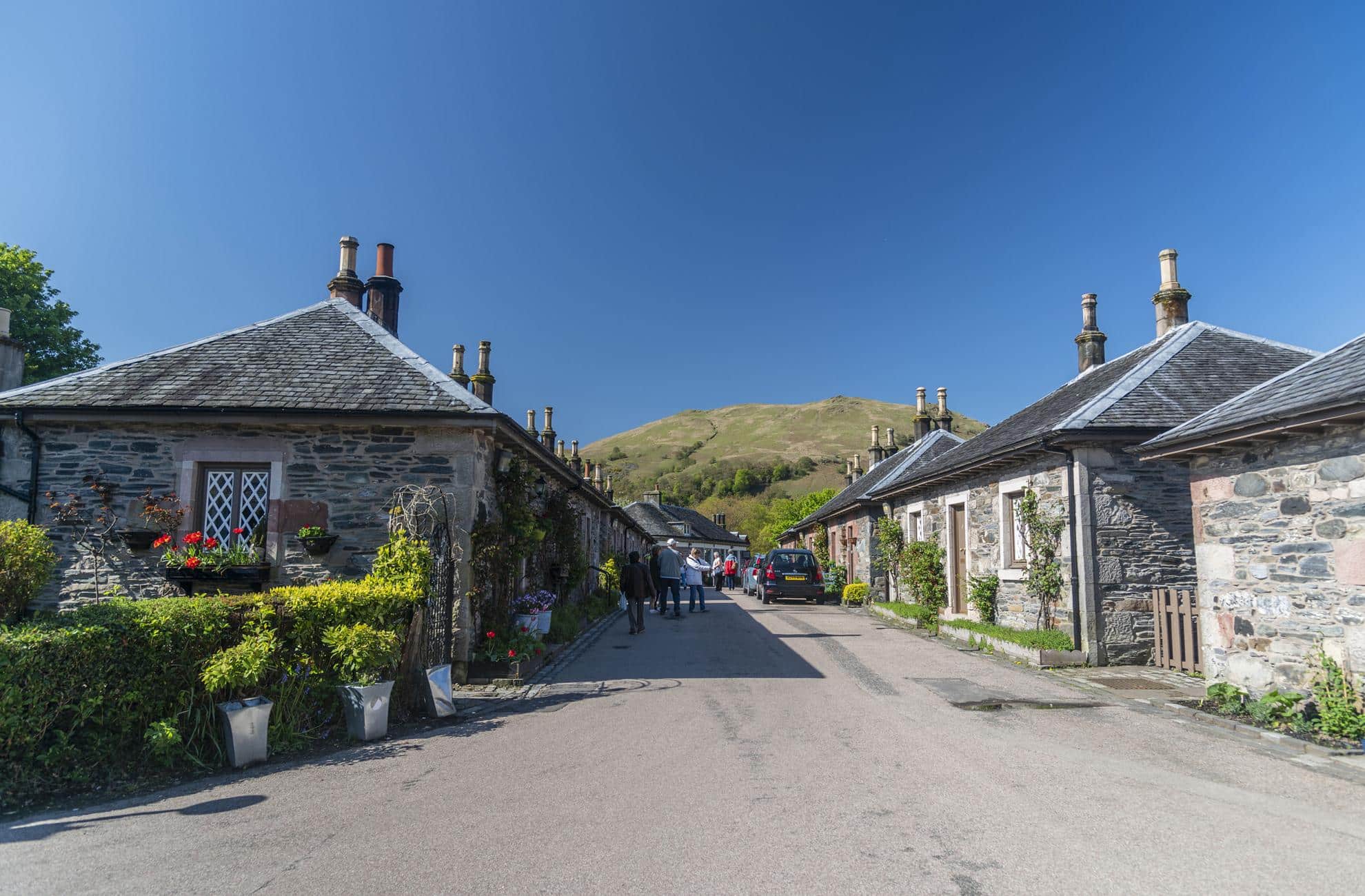 A street in Luss during a sunny day.