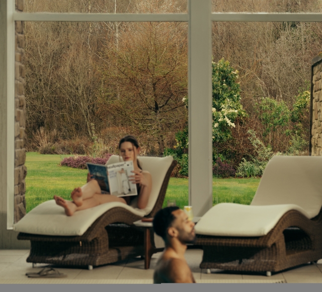 A couple relax in the Spa at The Carrick