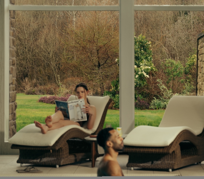 A couple relax in the Spa at The Carrick
