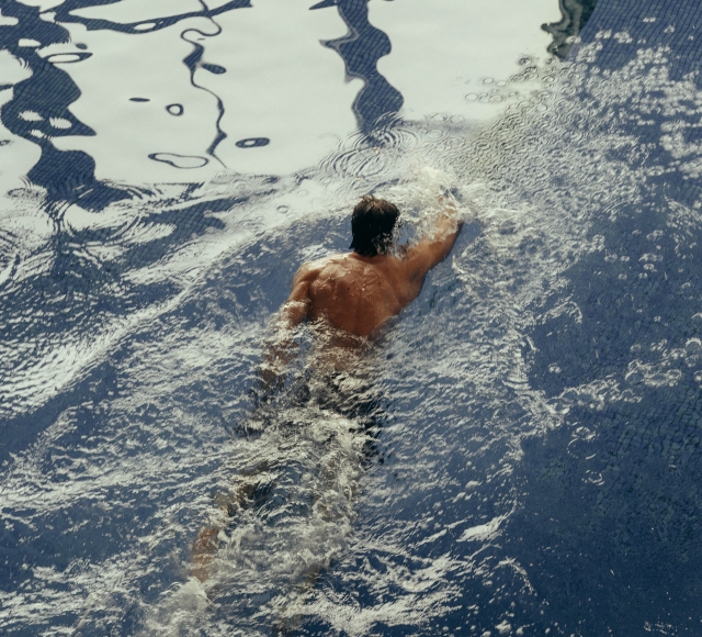 Person swimming lengths in the pool at the Cameron House Resort Health Club